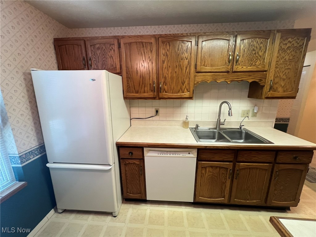 3068 Kent Road, Unit 410 Stow, OH 44224 - Photo 7 of 38 Fridge, dishwasher and sink