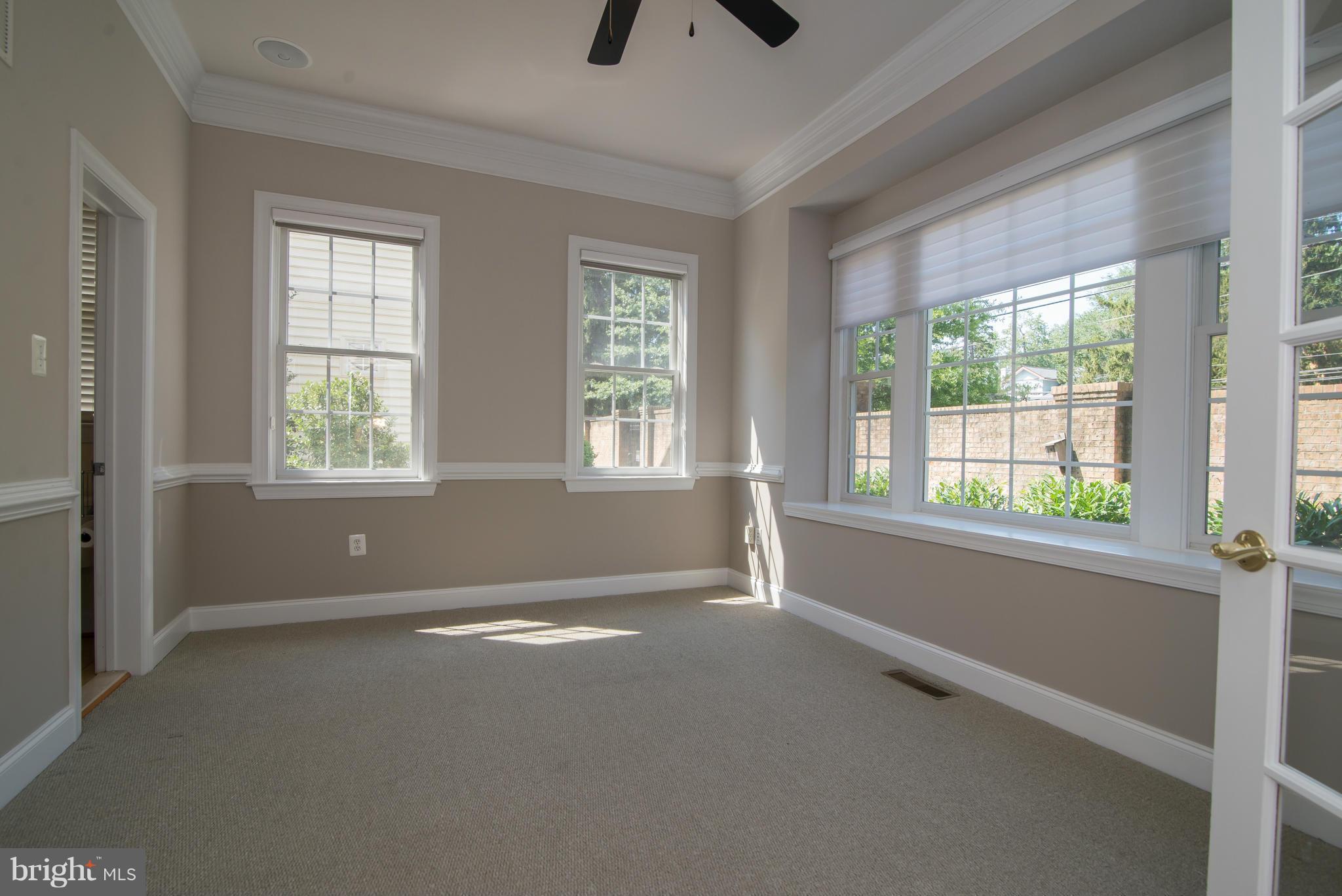 831 Woodside Parkway Silver Spring, MD 20910 - Photo 3 of 30 a view of an empty room with a window