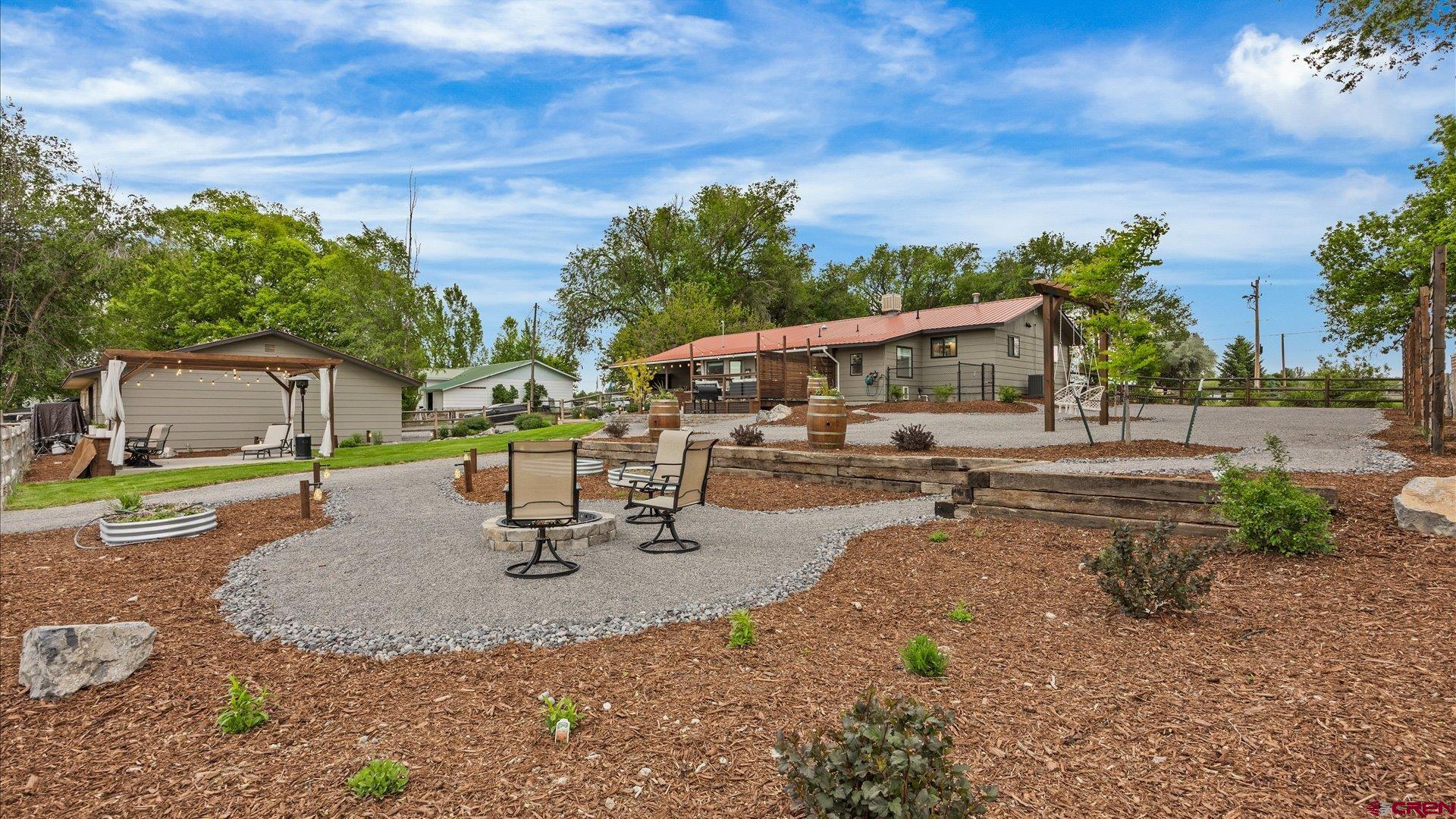 1761 G Road Delta, CO 81416 - Photo 40 of 43 a view of a backyard with a patio