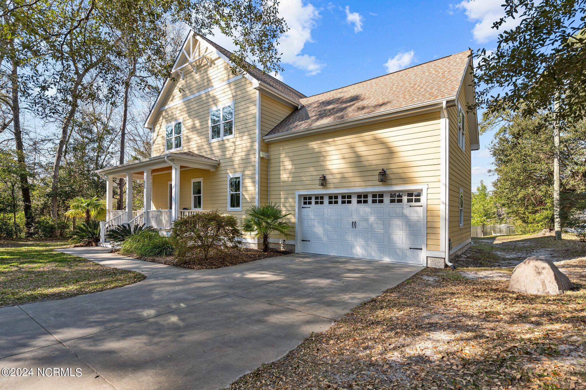435 Trails End Road Wilmington, NC 28409 - Photo 9 of 93 Two car garage with plentiful parking on the lot