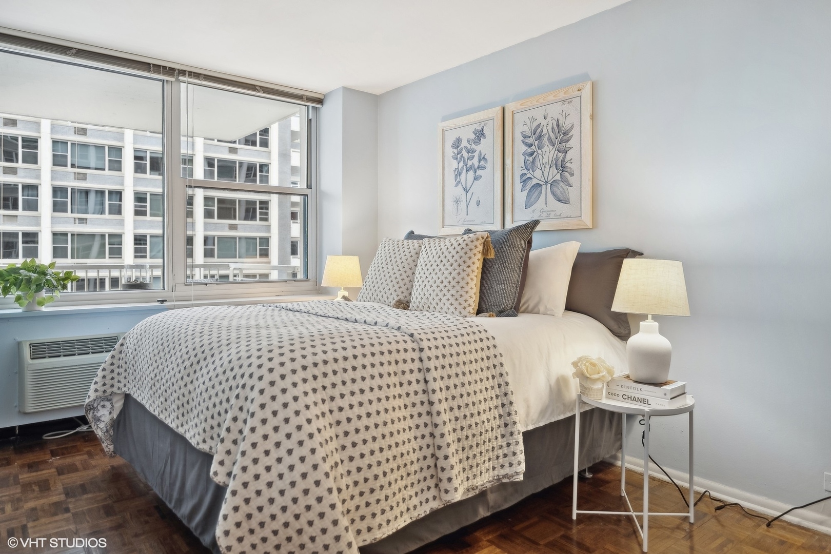 4250 North Marine Drive, Unit 2115 Chicago, IL 60613 - Photo 16 of 24 a bedroom with a bed and a large window