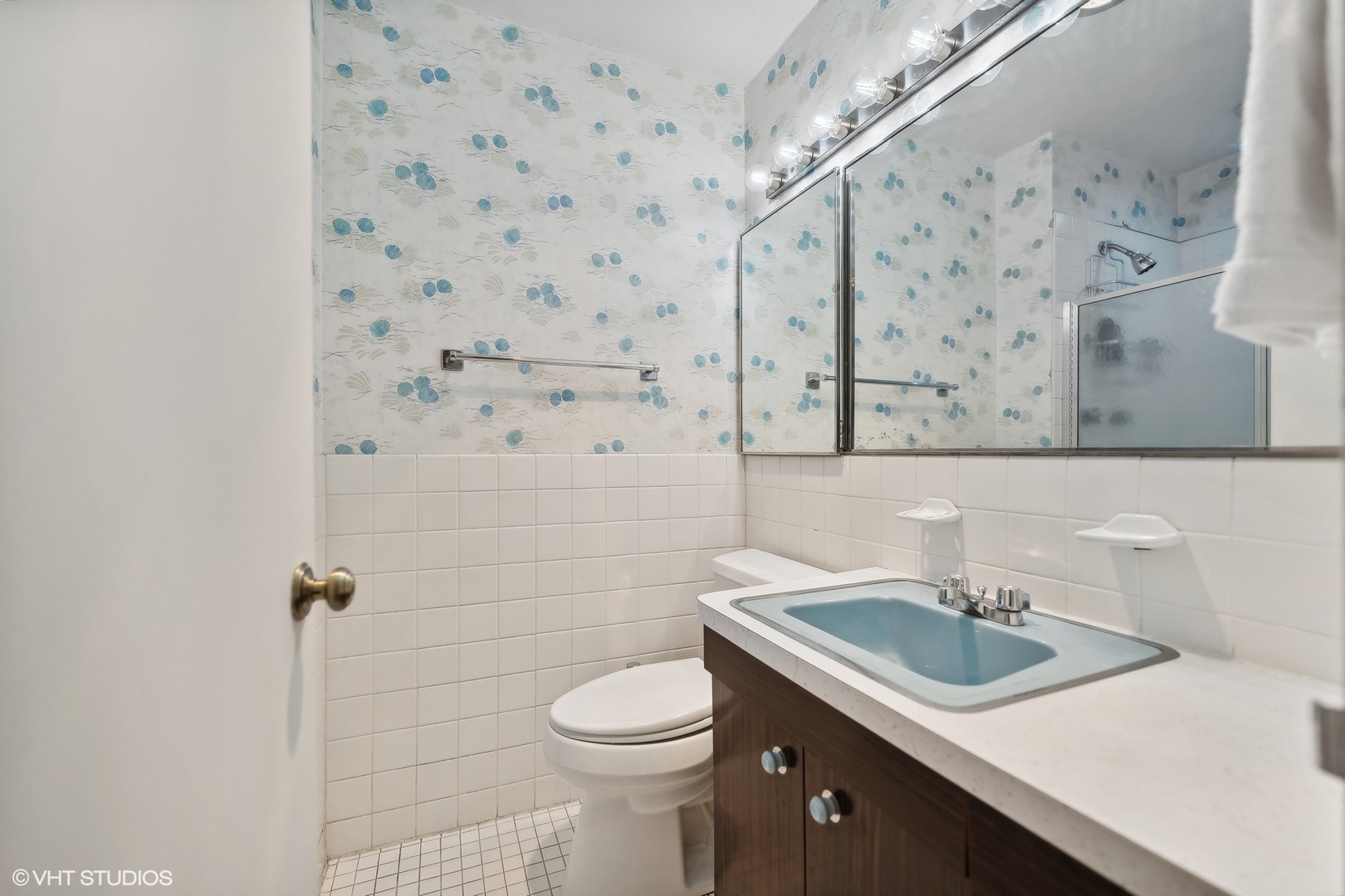 4250 North Marine Drive, Unit 2115 Chicago, IL 60613 - Photo 18 of 24 a bathroom with a sink a toilet and shower