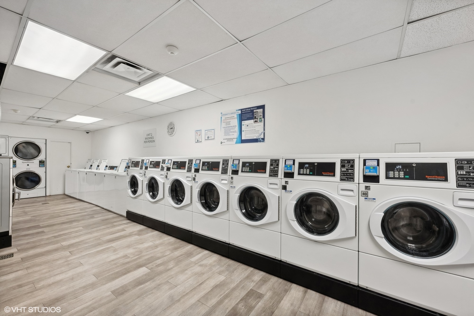 4250 North Marine Drive, Unit 2115 Chicago, IL 60613 - Photo 23 of 24 a utility room with dryer and washer