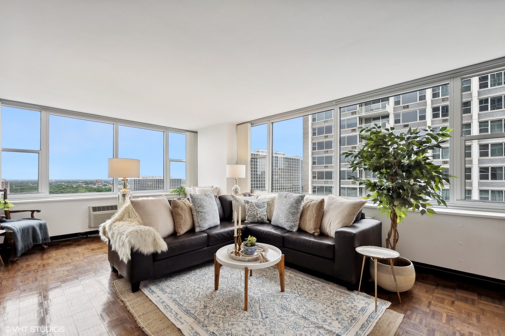 4250 North Marine Drive, Unit 2115 Chicago, IL 60613 - Photo 4 of 24 a living room with furniture and a large window