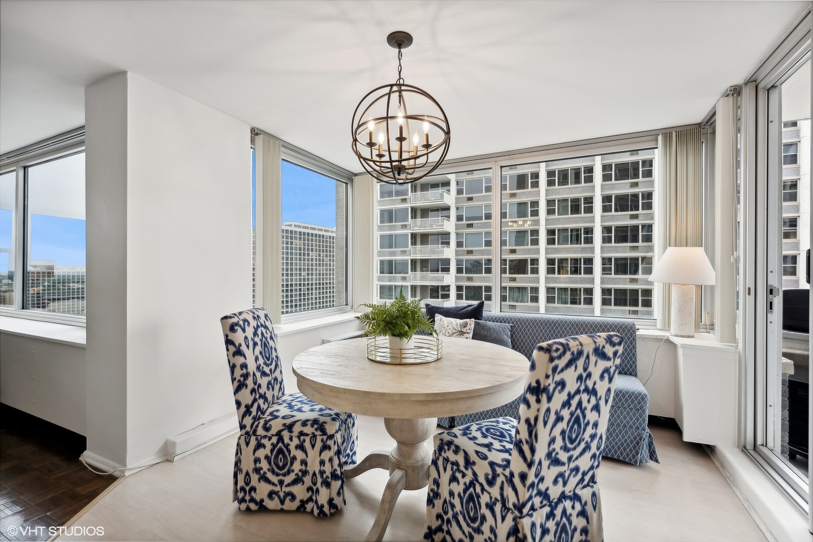 4250 North Marine Drive, Unit 2115 Chicago, IL 60613 - Photo 7 of 24 a view of a dining room with furniture window and outside view