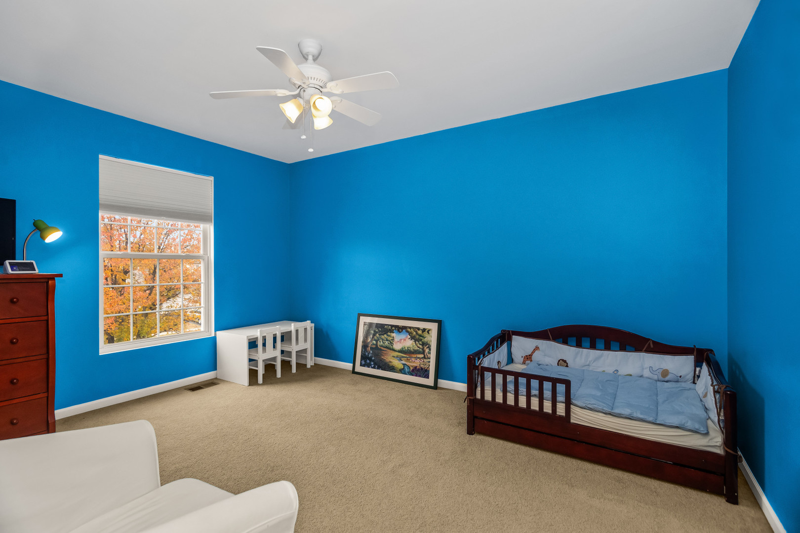 282 Crabapple Street Bolingbrook, IL 60490 - Photo 16 of 23 a bedroom with furniture and a window