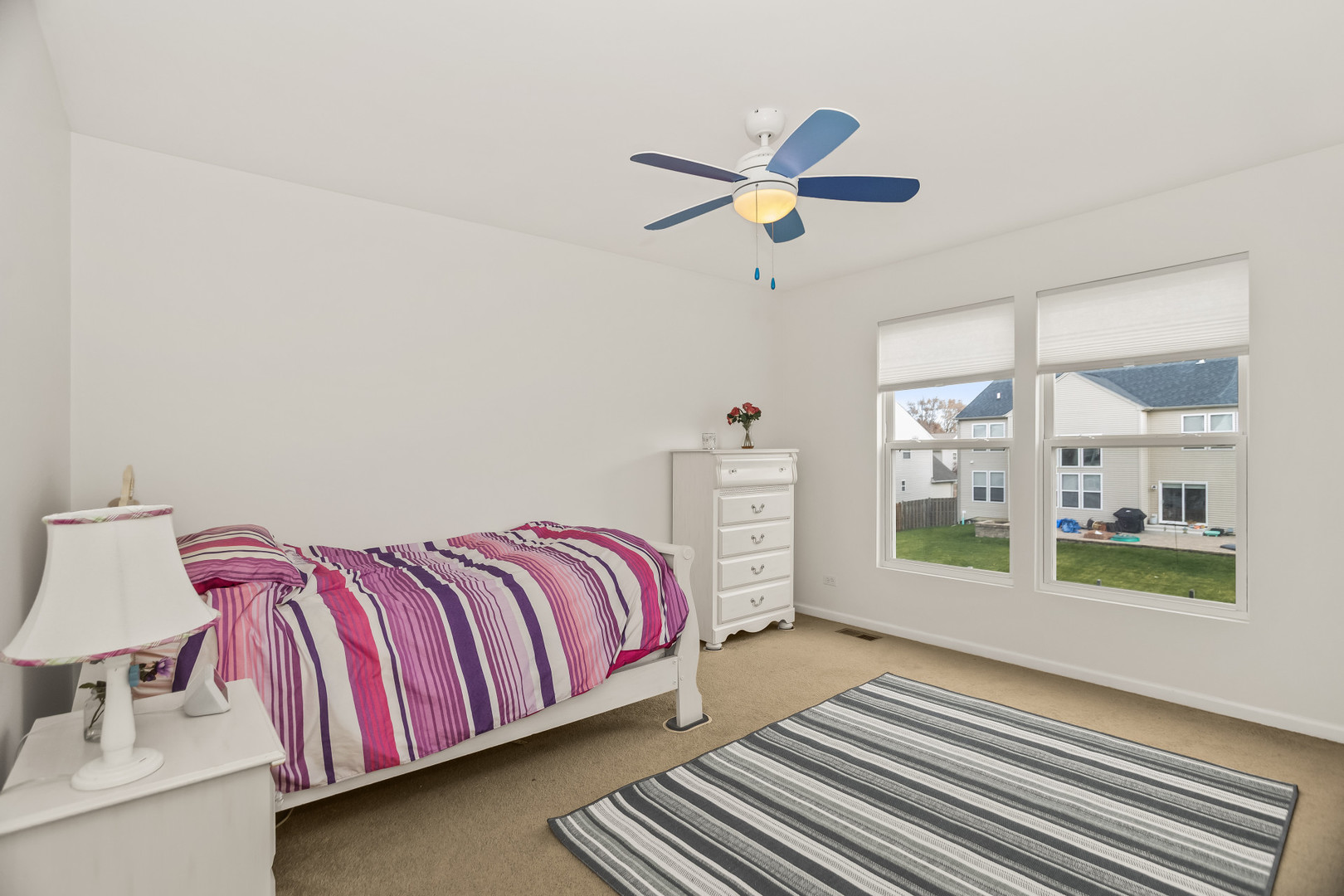 282 Crabapple Street Bolingbrook, IL 60490 - Photo 17 of 23 a bedroom with a bed and window