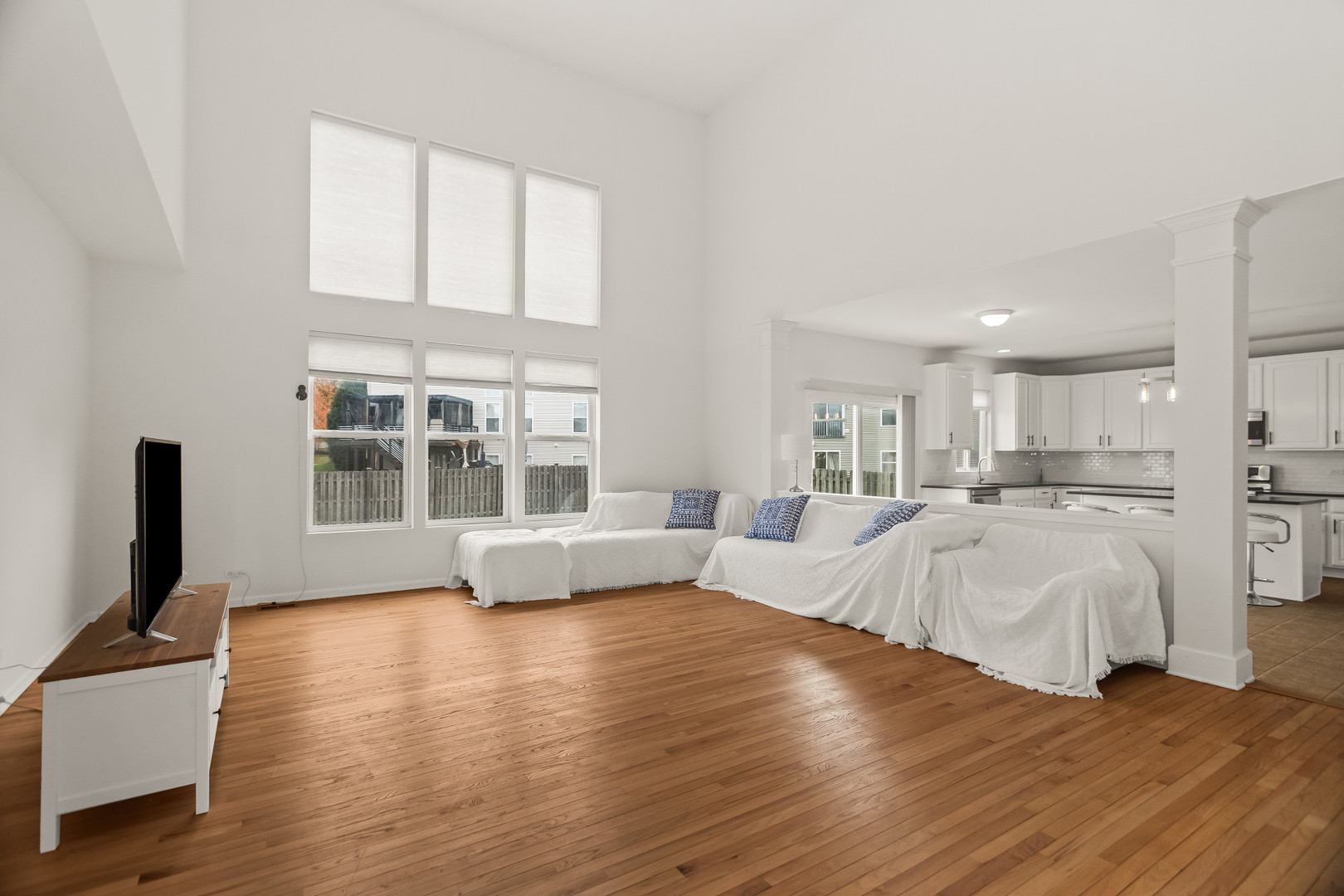 282 Crabapple Street Bolingbrook, IL 60490 - Photo 2 of 23 a living room with furniture and a flat screen tv