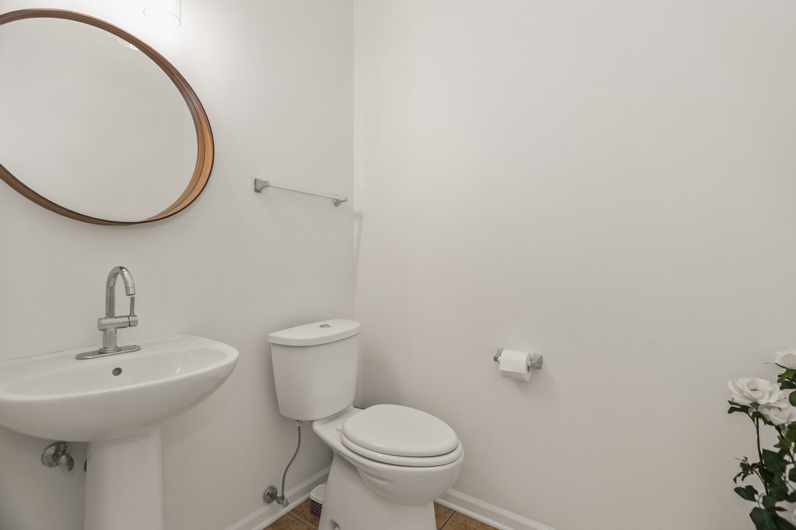 282 Crabapple Street Bolingbrook, IL 60490 - Photo 10 of 23 a bathroom with a sink and a mirror