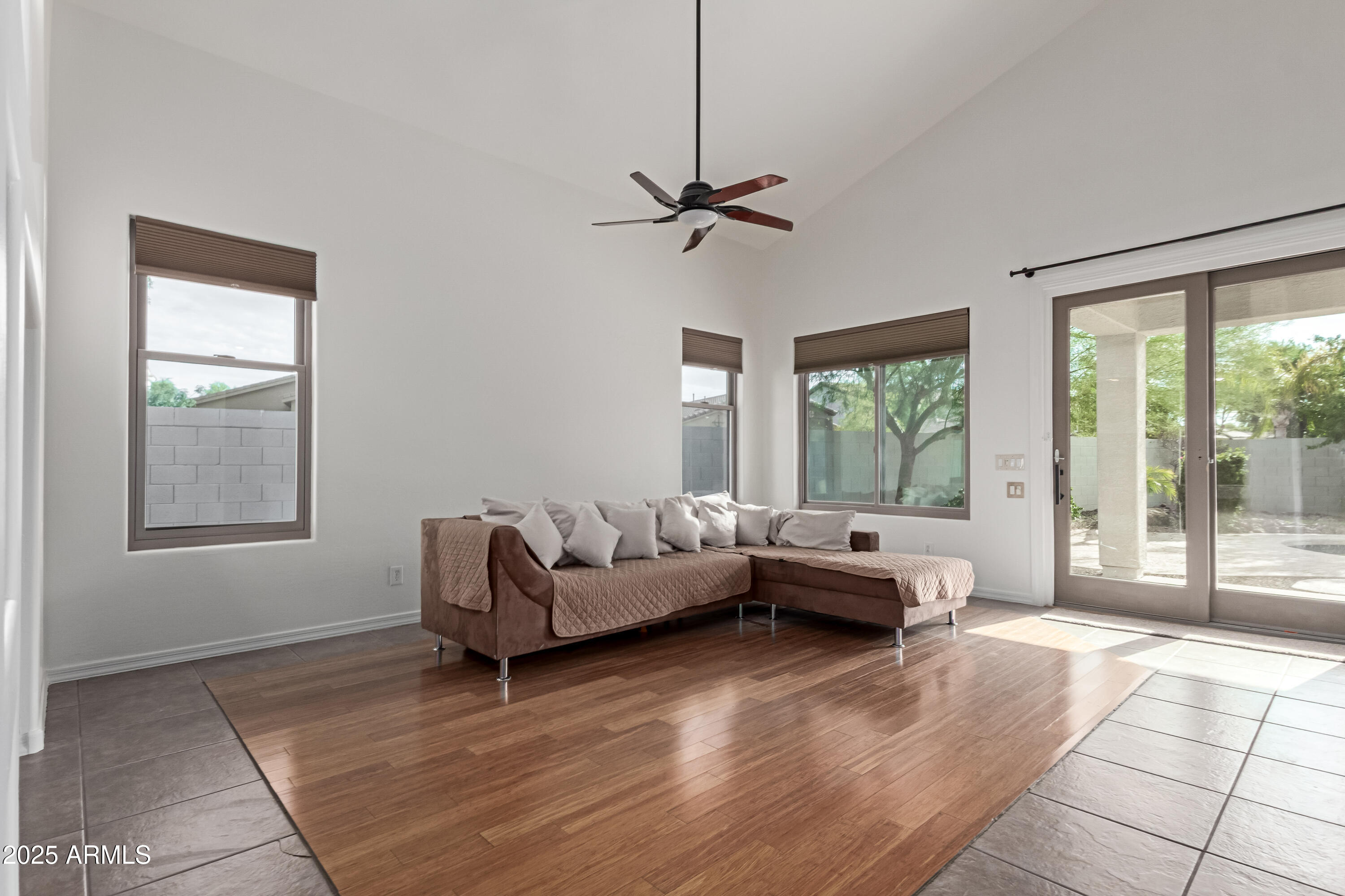 5752 South Crossbow Place Chandler, AZ 85249 - Photo 12 of 51 a living room with furniture and a window