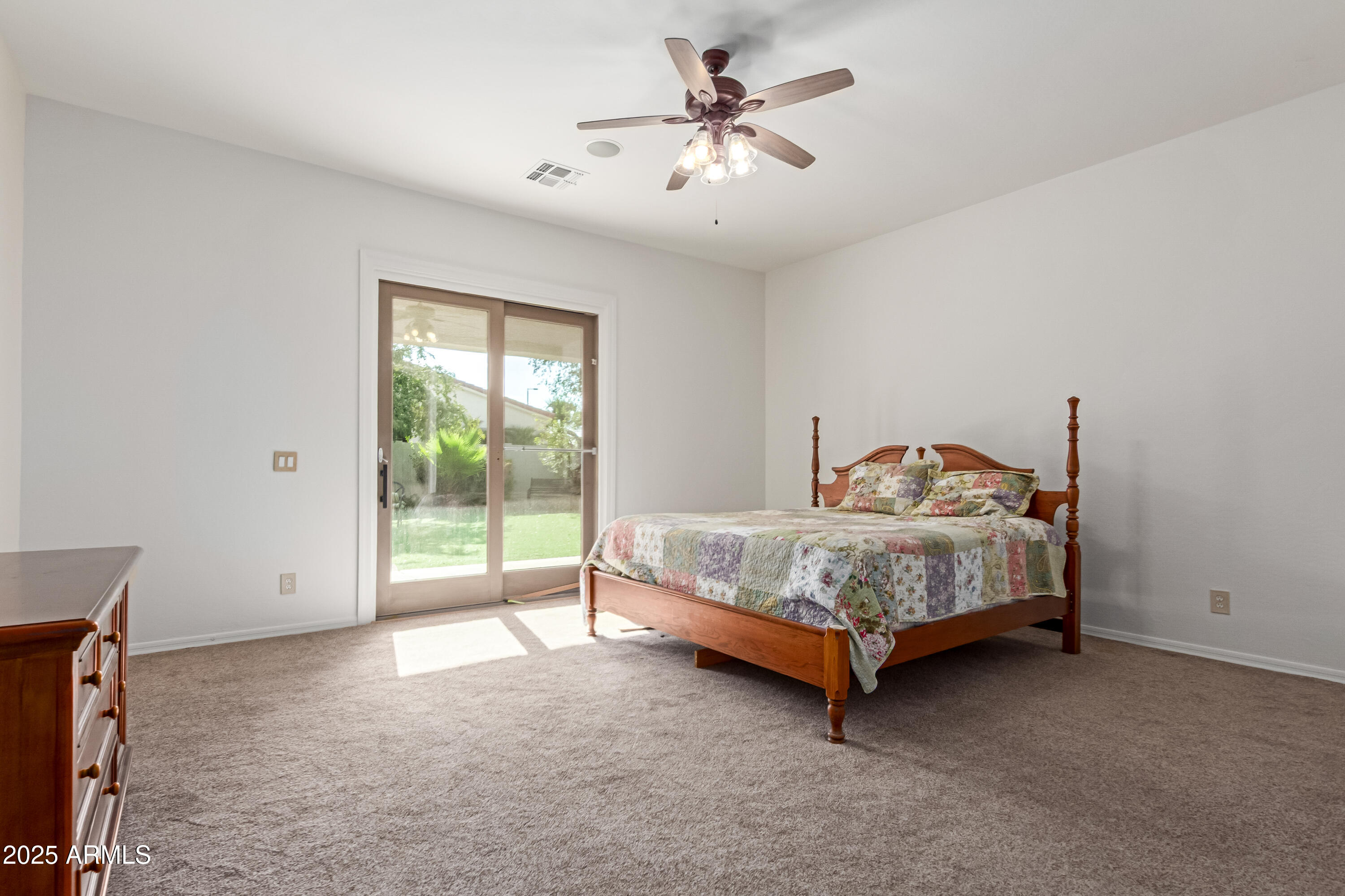 5752 South Crossbow Place Chandler, AZ 85249 - Photo 18 of 51 a bedroom with a bed and a tv