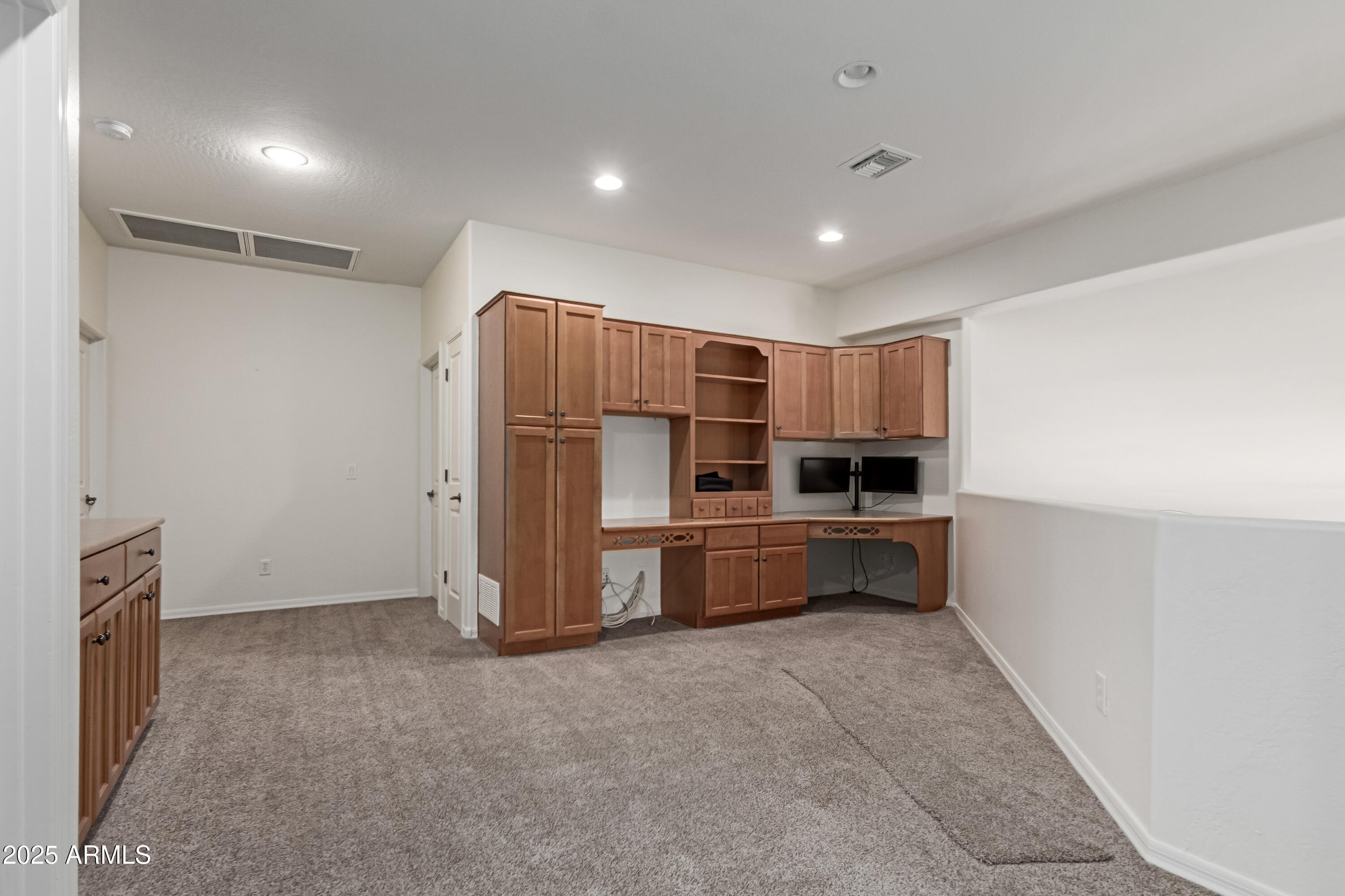 5752 South Crossbow Place Chandler, AZ 85249 - Photo 23 of 51 a kitchen with refrigerator and cabinets