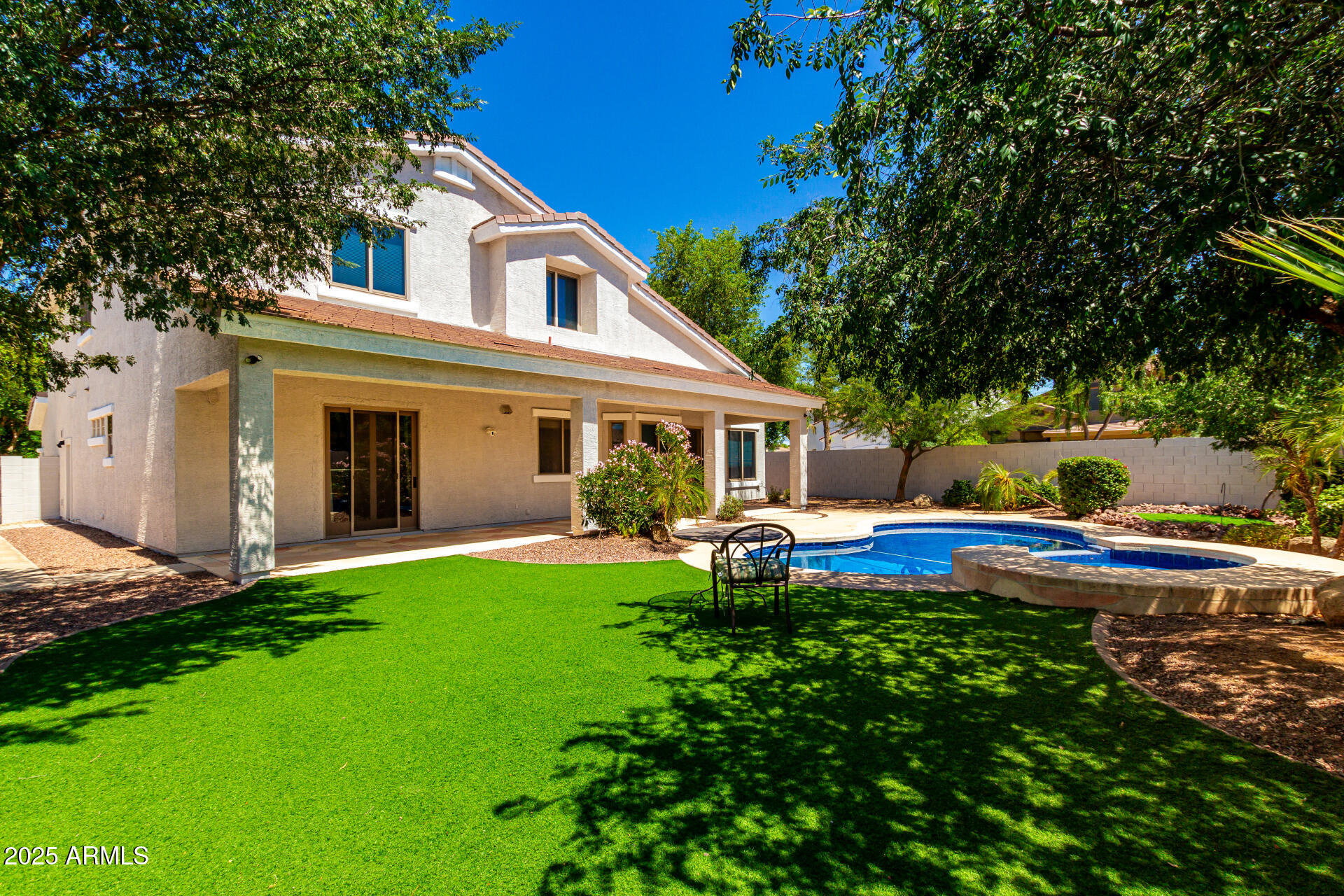 5752 South Crossbow Place Chandler, AZ 85249 - Photo 40 of 51 a view of a house with a yard and sitting area