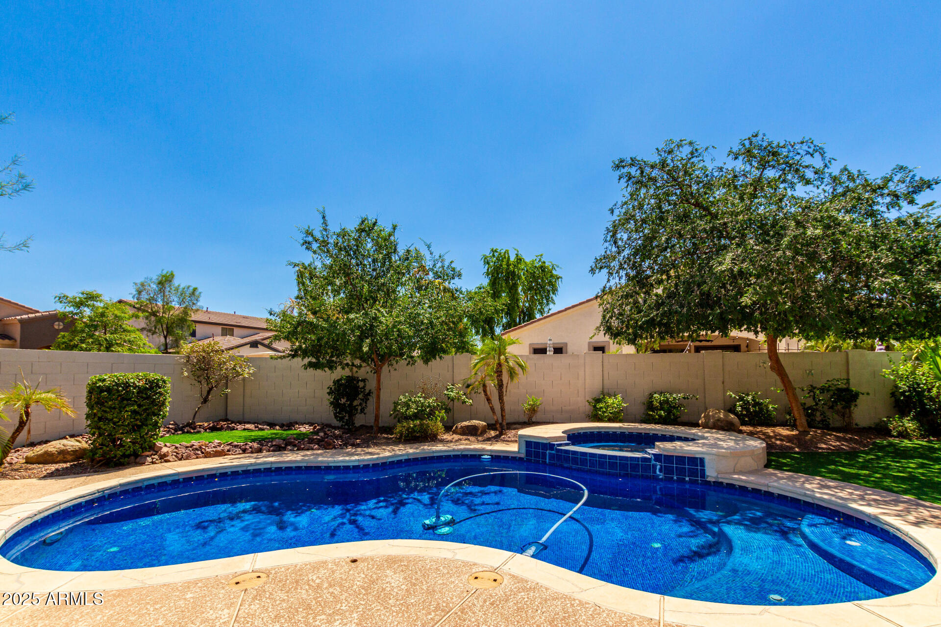5752 South Crossbow Place Chandler, AZ 85249 - Photo 41 of 51 a view of swimming pool with outdoor seating