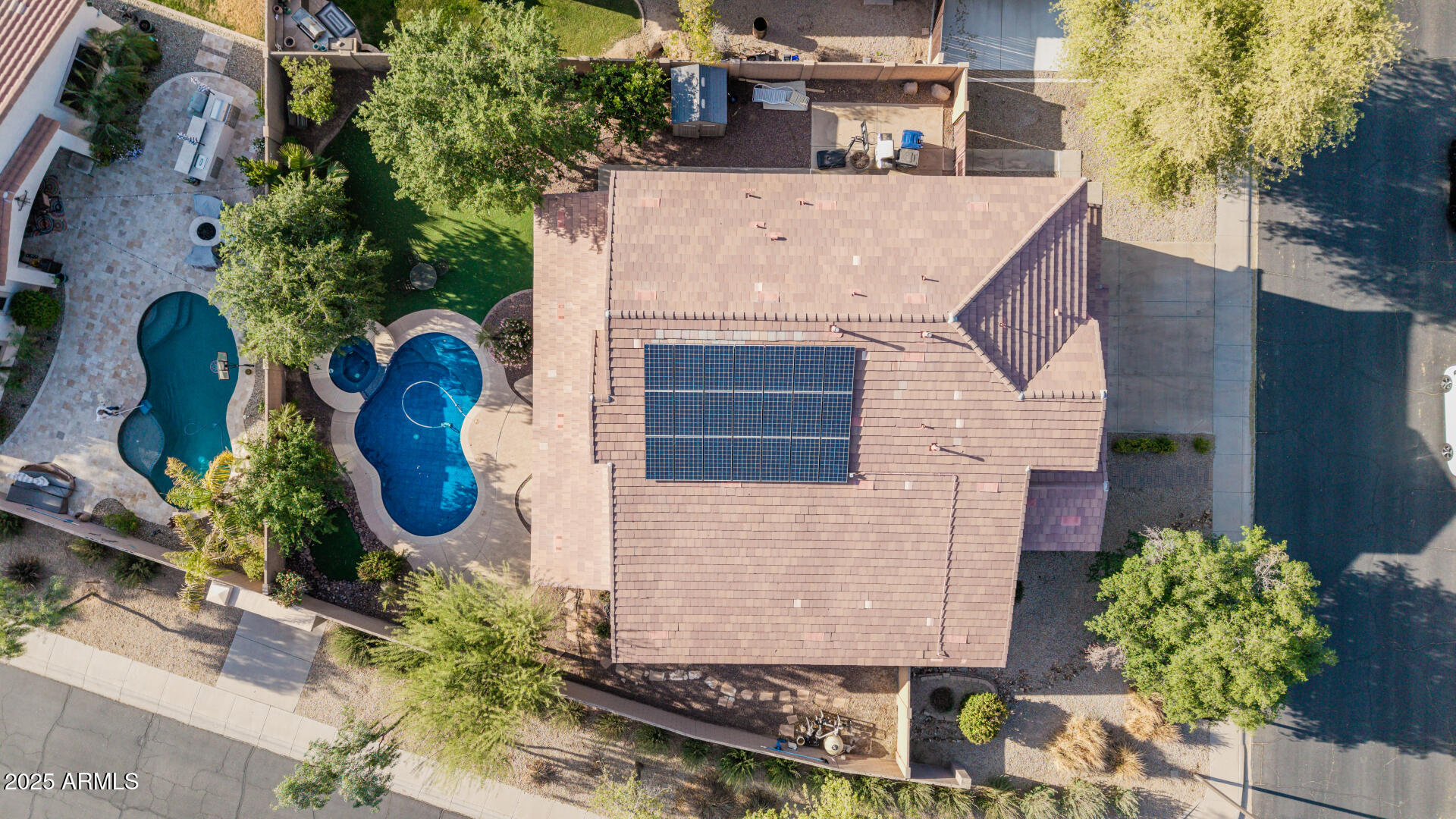 5752 South Crossbow Place Chandler, AZ 85249 - Photo 47 of 51 a aerial view of a house with garden space and plants