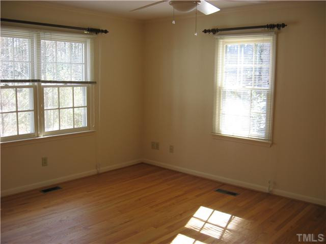 719 Runnymede Road Raleigh, NC 27607 - Photo 18 of 25 Fourth bedroom has lots of light and a back yard view. Bedroom