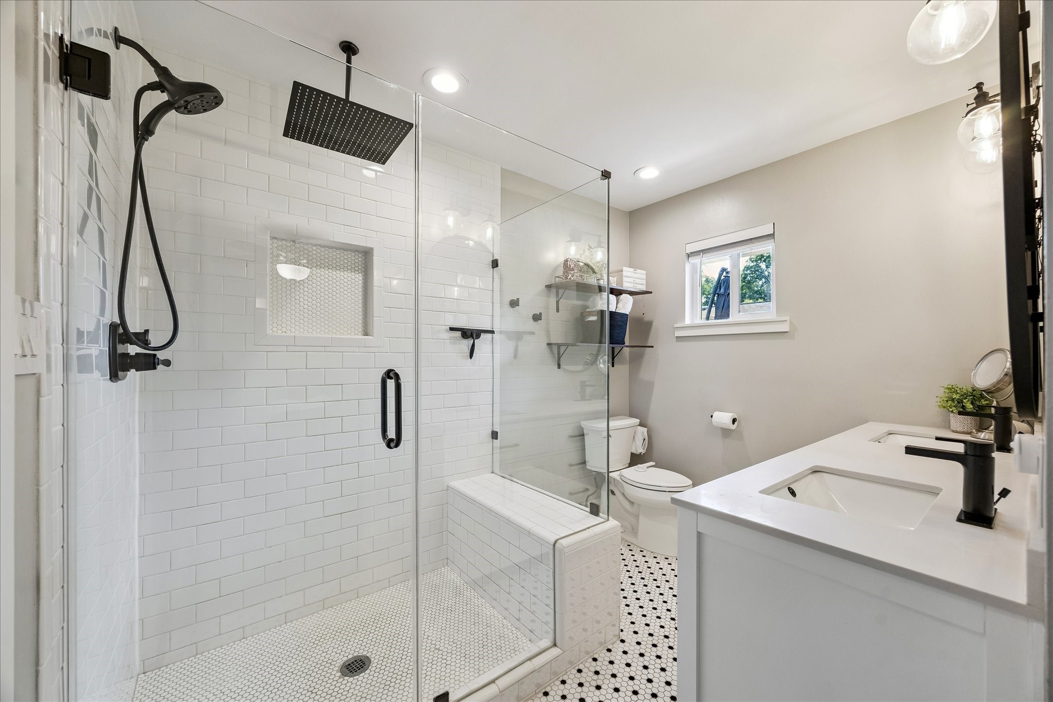 2203 Lamonte Lane Houston, TX 77018 - Photo 13 of 25 a bathroom with a sink mirror and shower