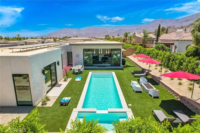 a view of an outdoor space pool patio and outdoor seating