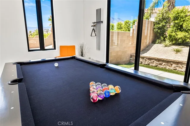 a kitchen with a large window and a sink