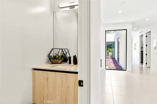 a bedroom with a bed and night stand