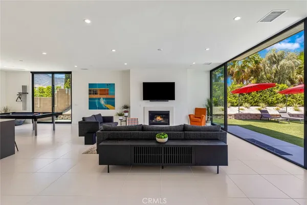 a view of an chairs and tables in the patio