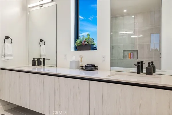a bathroom with a bathtub and a sink