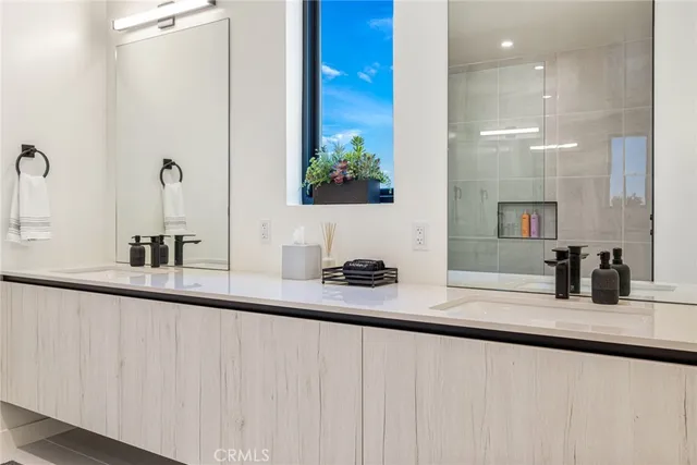 a bathroom with a bathtub and a sink