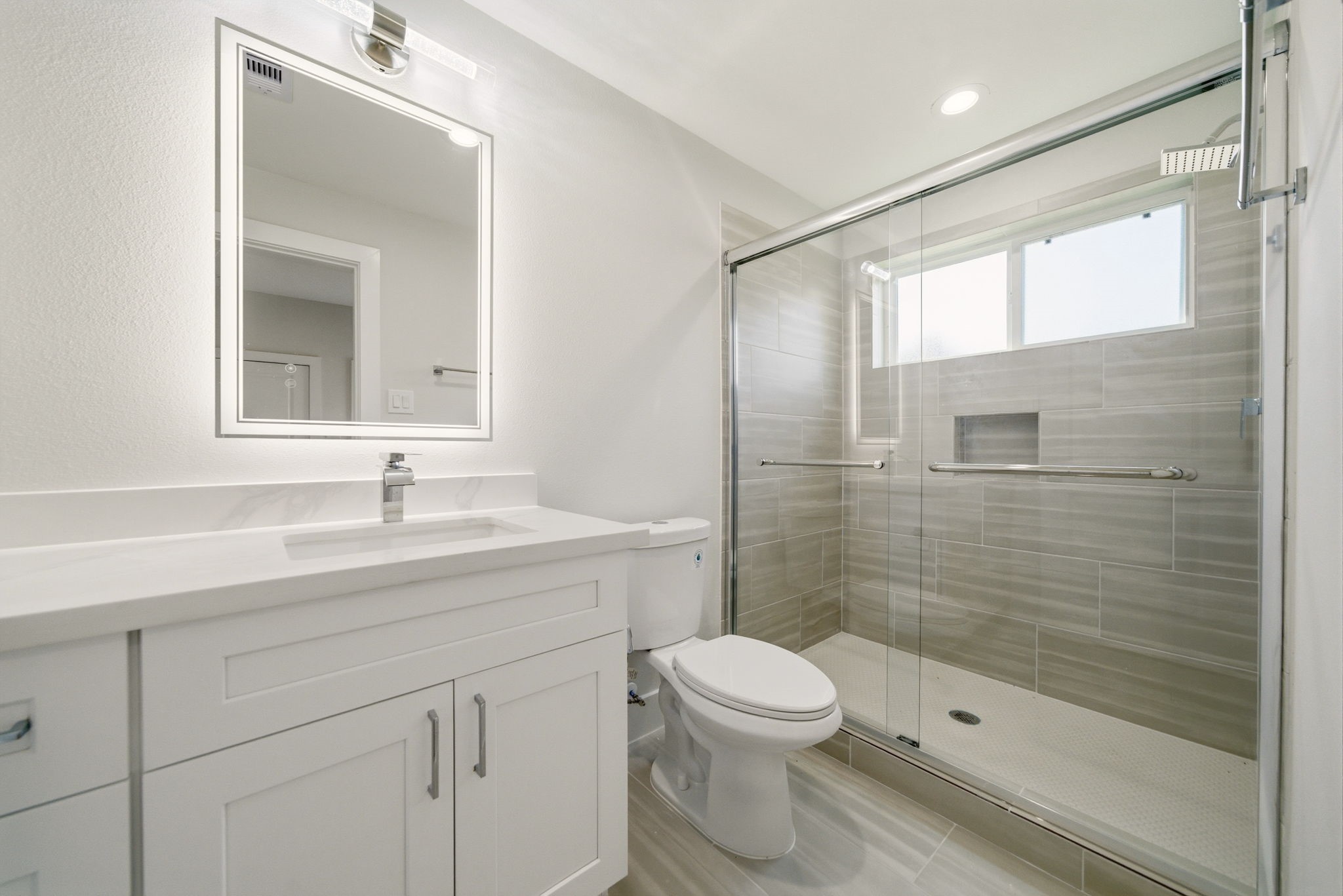 1398 Cedar Post Lane Houston, TX 77080 - Photo 24 of 33 a bathroom with a sink a toilet and shower