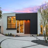 a front view of a house with a garage