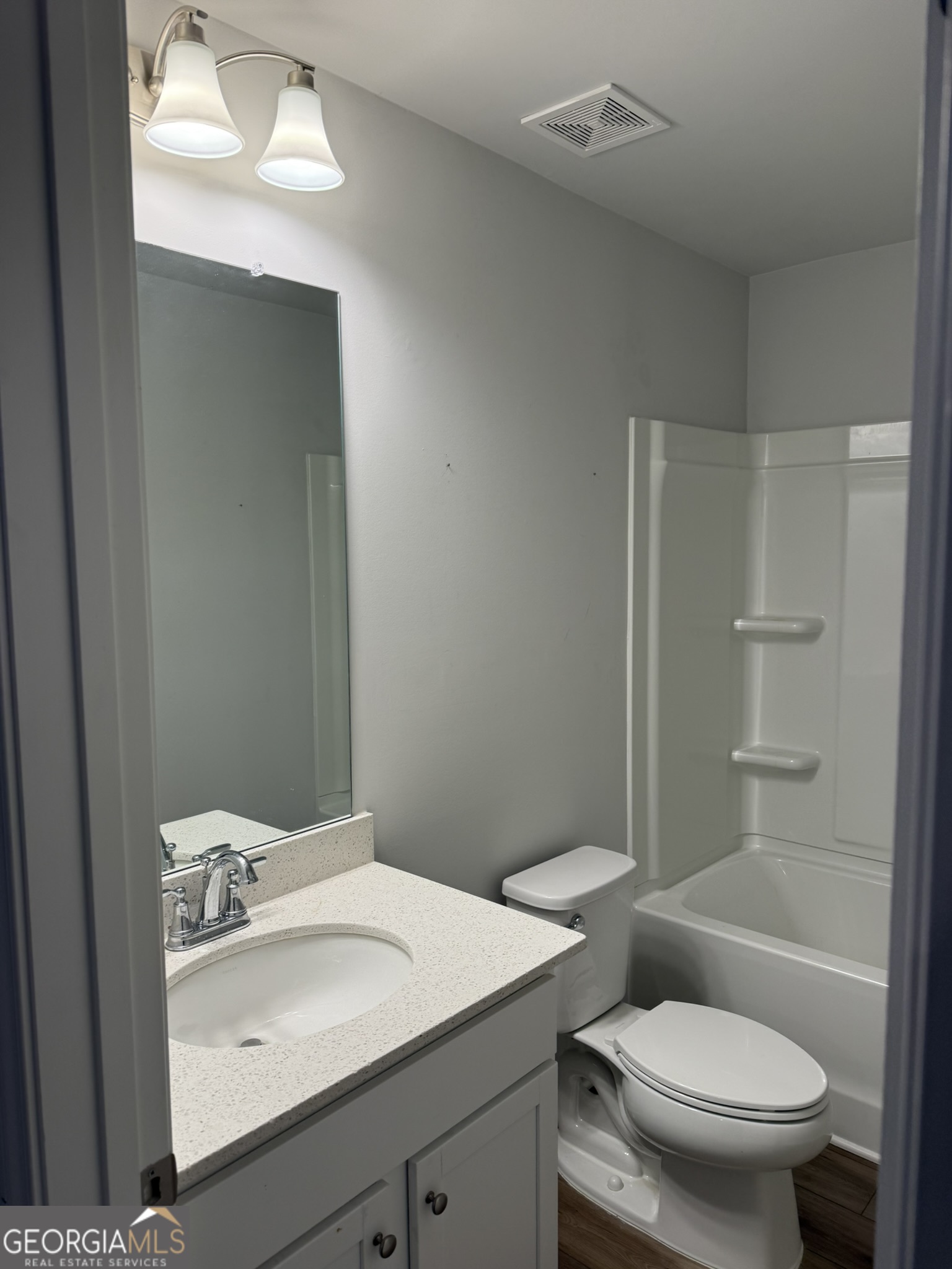 417 Sawmill Trace Hampton, GA 30228 - Photo 27 of 27 a bathroom with a sink toilet and shower