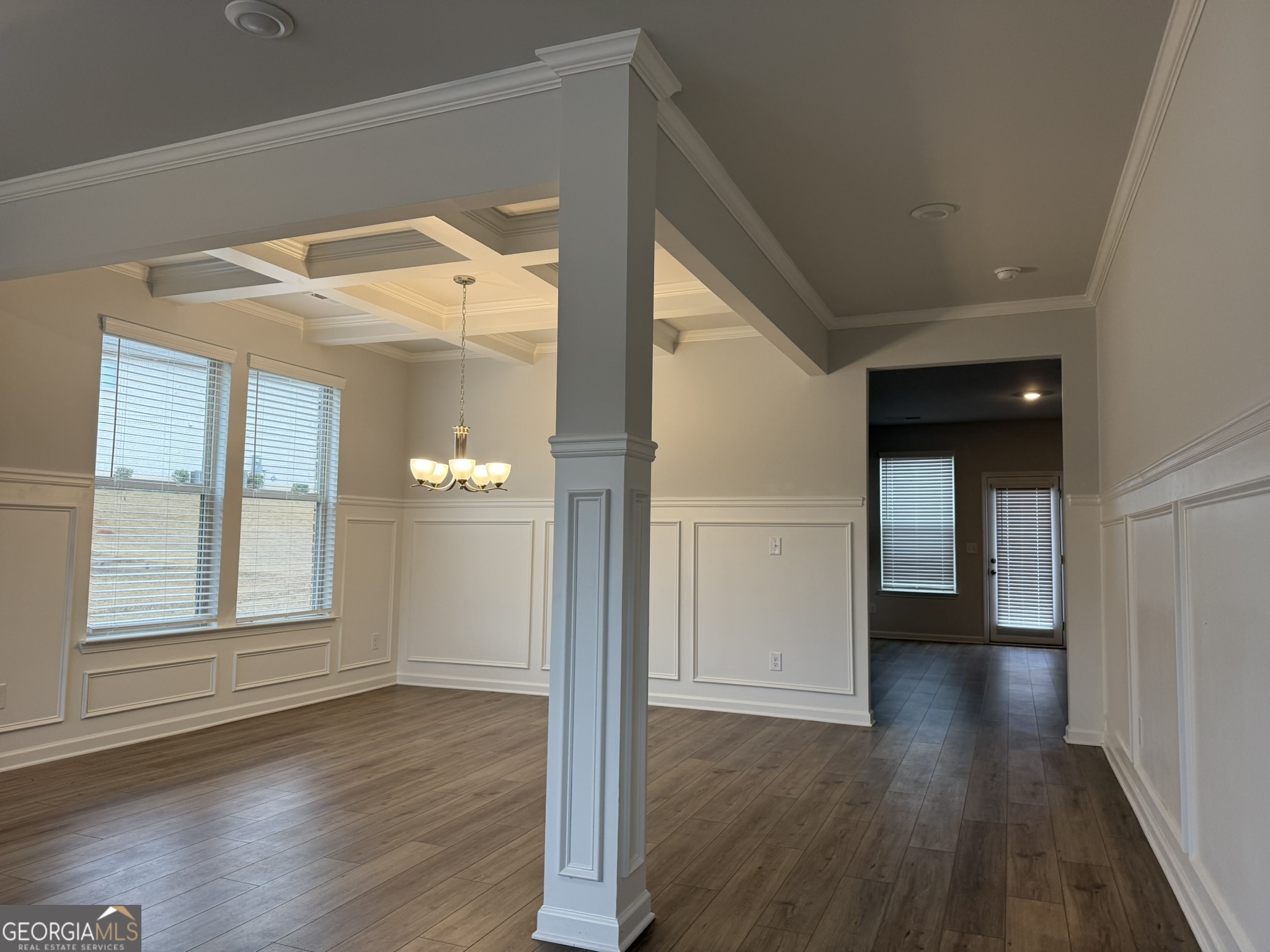 417 Sawmill Trace Hampton, GA 30228 - Photo 3 of 27 wooden floor in an empty room with a window