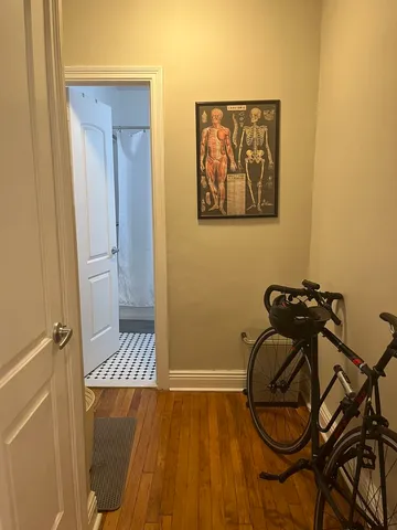 a work room with furniture and rug