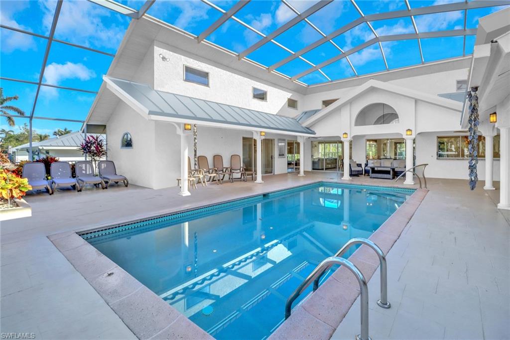 1275 Cobia Court Naples, FL 34102 - Photo 8 of 25 Rendered and Reimagined Pool area