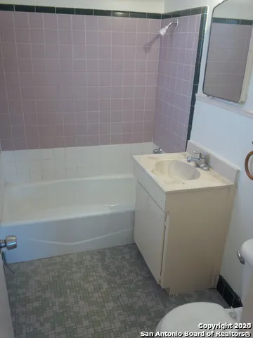a bathroom with a sink and a toilet