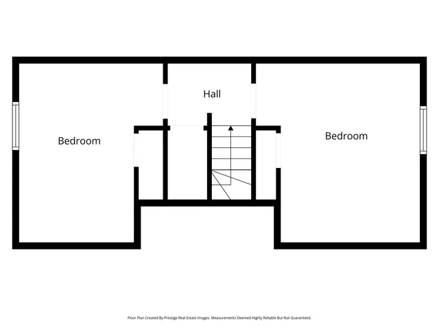 a picture of floor with a white wall and a painting