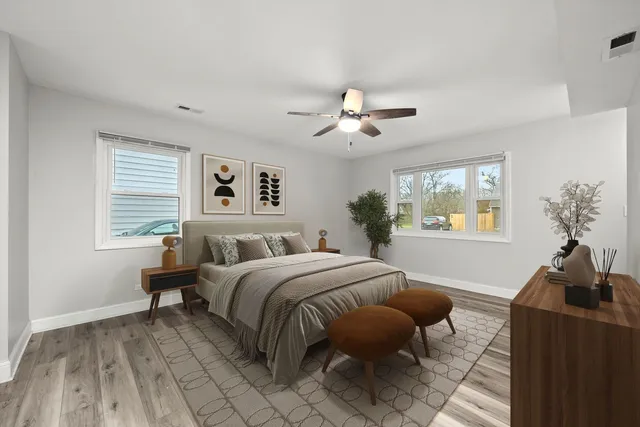 a bed room with a bed and a couch