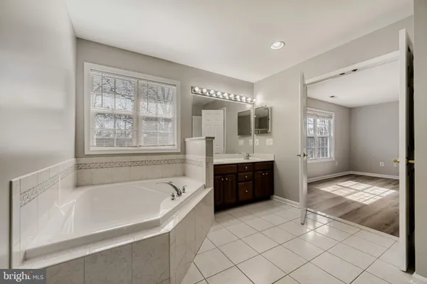 a bathroom with a toilet sink and shower