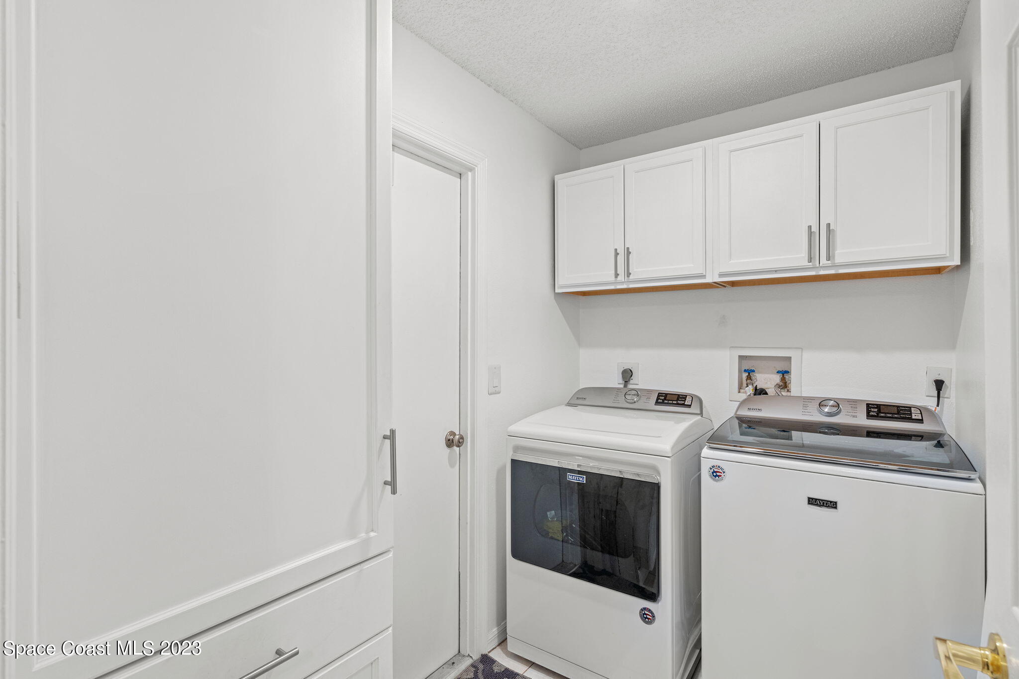 2310 Shady Oak Road Melbourne, FL 32935 - Photo 35 of 50 Laundry Room + Storage