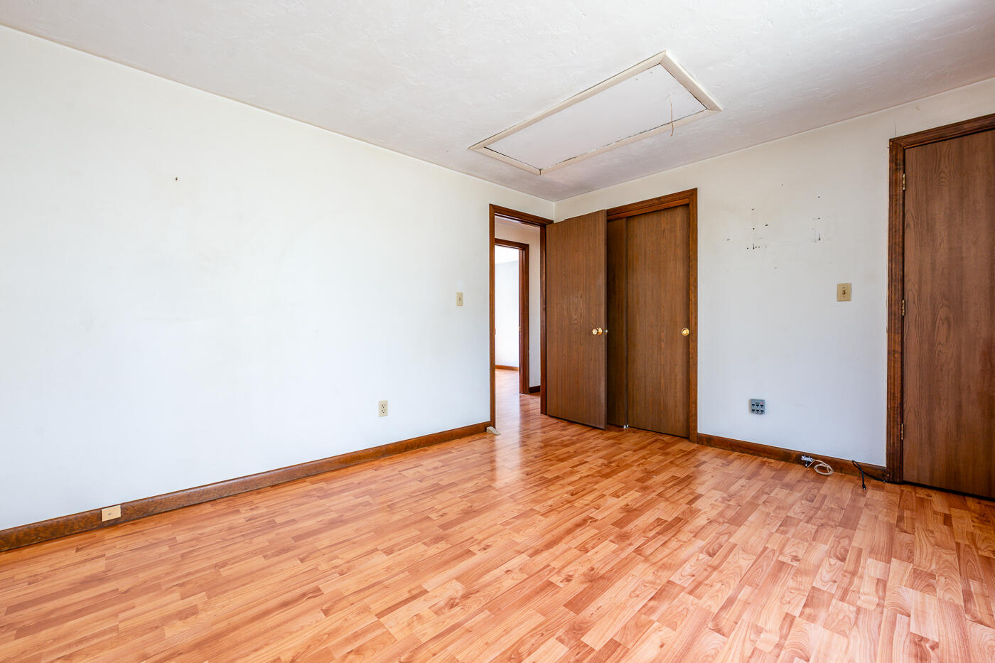 27 Howard Avenue Monument Beach, MA 02532 - Photo 13 of 24 an empty room with wooden floor and windows