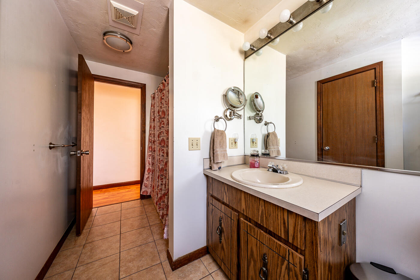 27 Howard Avenue Monument Beach, MA 02532 - Photo 10 of 24 a bathroom with a sink and a mirror