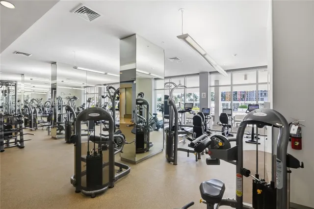 a room with a mirror and a table