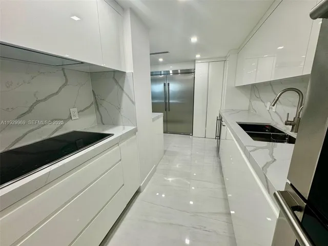 a utility room with dryer washer and dryer