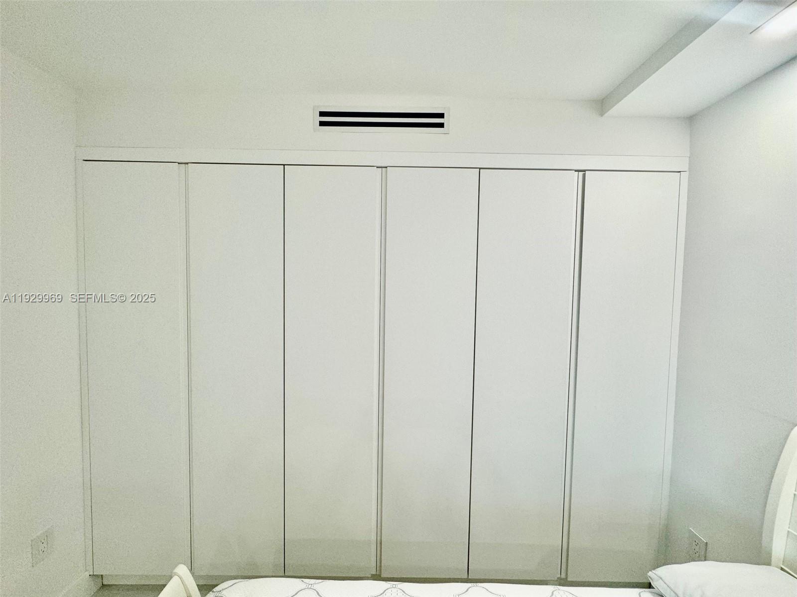 9801 Collins Avenue, Unit 5U Bal Harbour, FL 33154 - Photo 18 of 62 a bathroom with a shower curtain