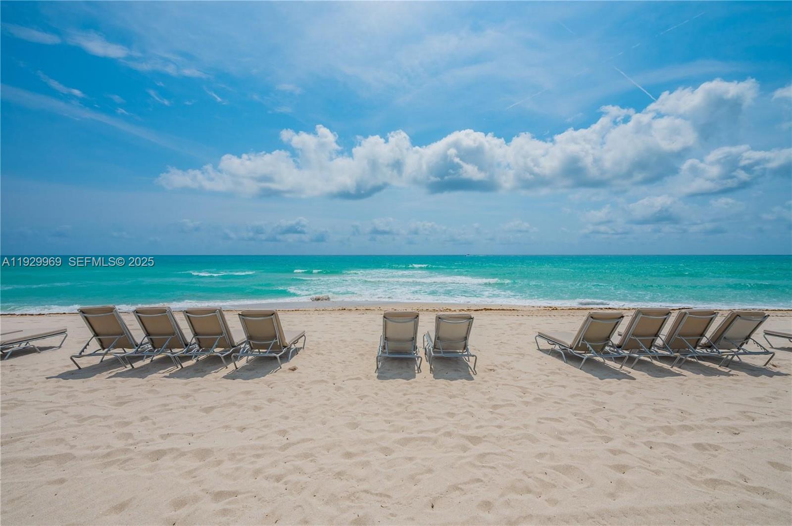 9801 Collins Avenue, Unit 5U Bal Harbour, FL 33154 - Photo 45 of 62 a view of a lake with a yard and sitting area