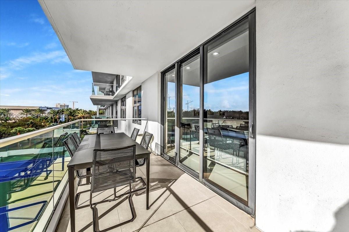 9801 Collins Avenue, Unit 5U Bal Harbour, FL 33154 - Photo 46 of 80 a balcony and view of living room
