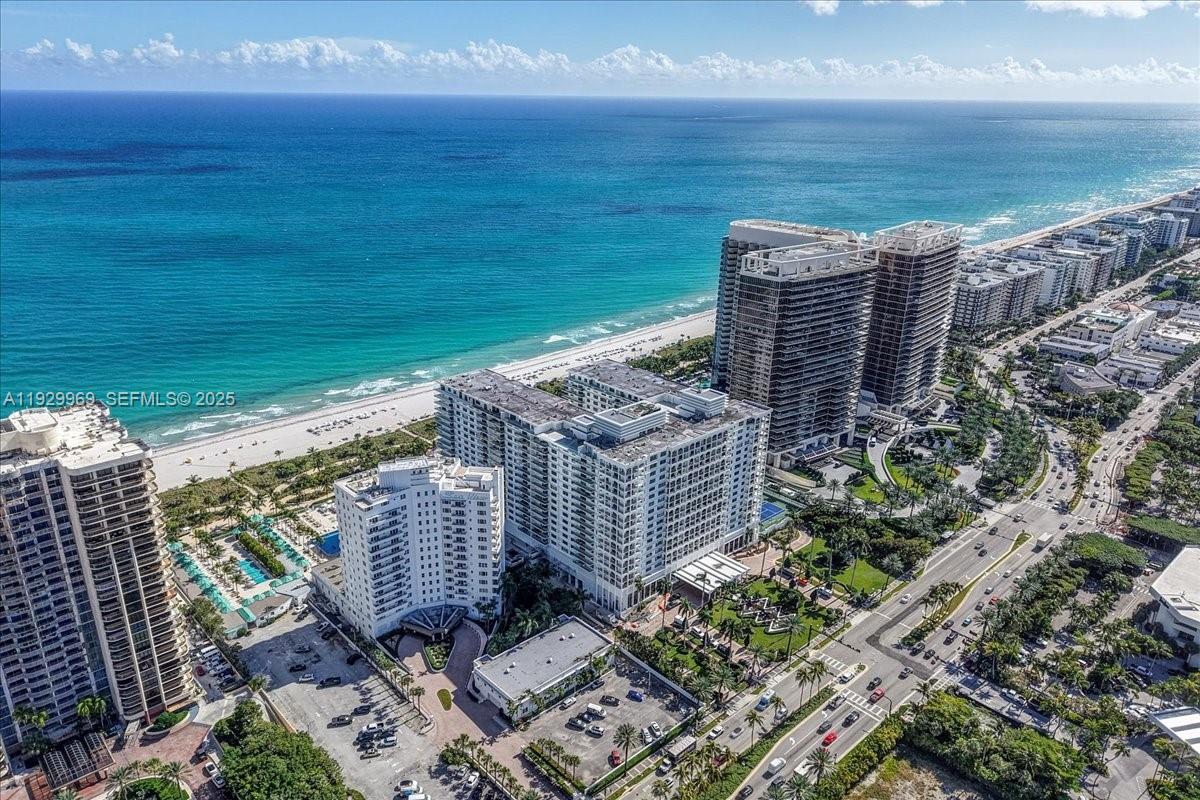 9801 Collins Avenue, Unit 5U Bal Harbour, FL 33154 - Photo 56 of 62 a view of a balcony with an ocean view
