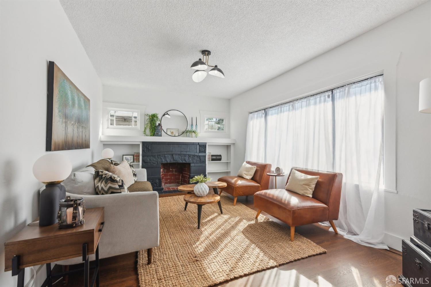 1521 Mitchell Street Oakland, CA 94601 - Photo 1 of 28 a living room with furniture and a fireplace