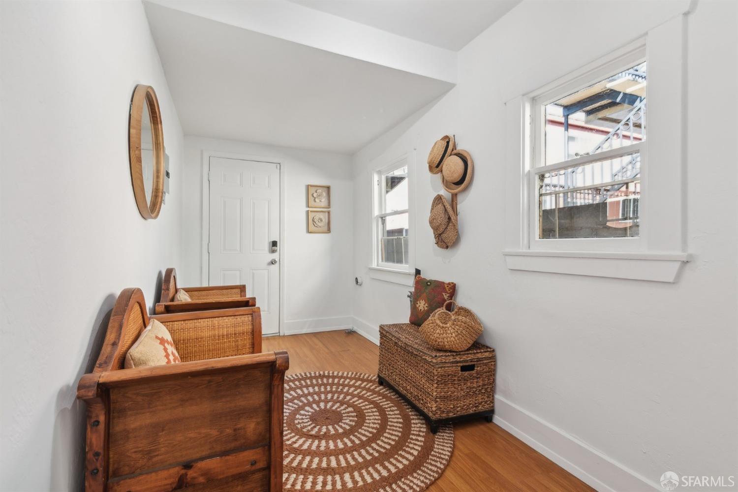 1521 Mitchell Street Oakland, CA 94601 - Photo 21 of 28 a living room with furniture and a window