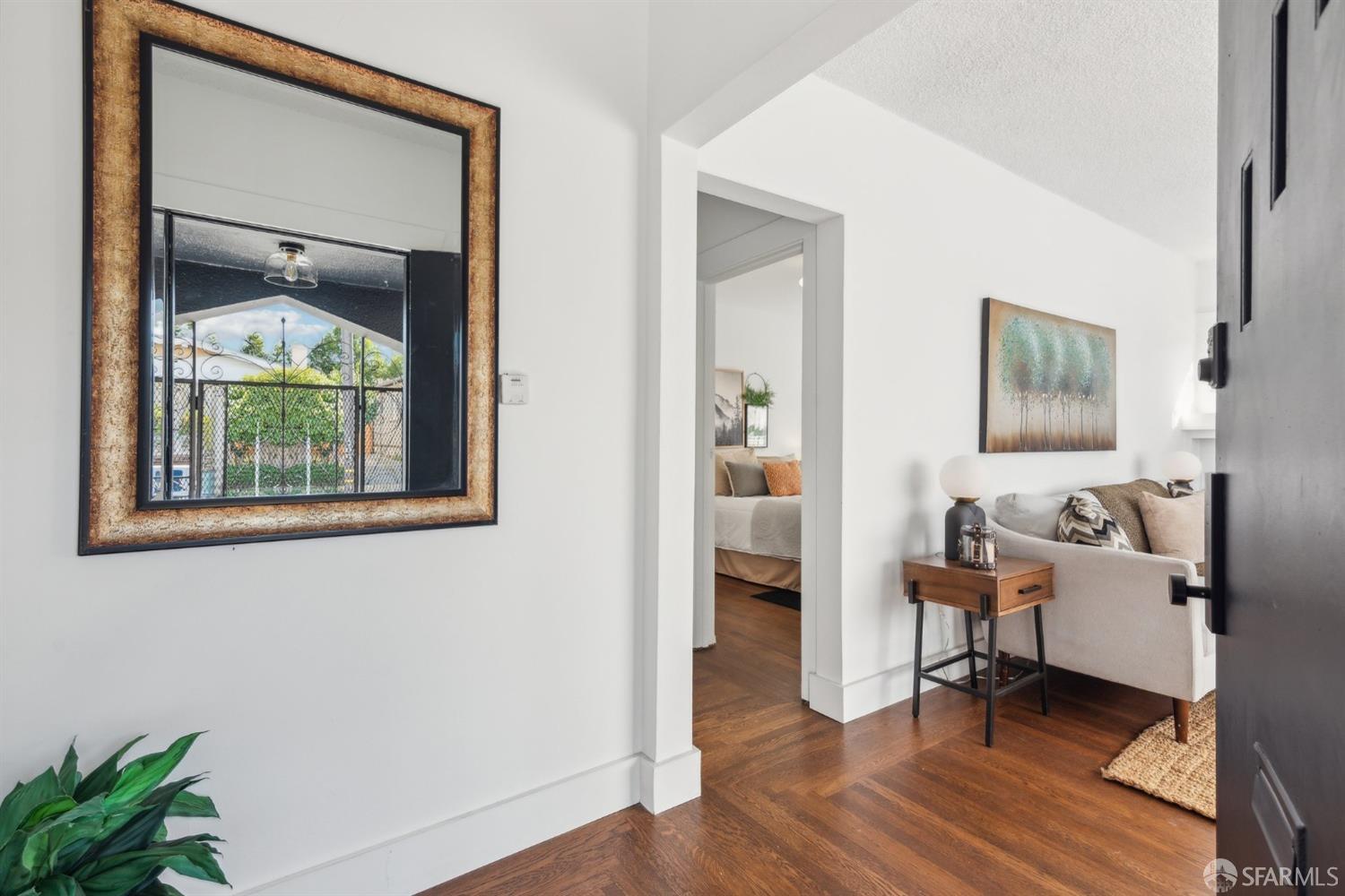 1521 Mitchell Street Oakland, CA 94601 - Photo 6 of 28 a living room with furniture and a window
