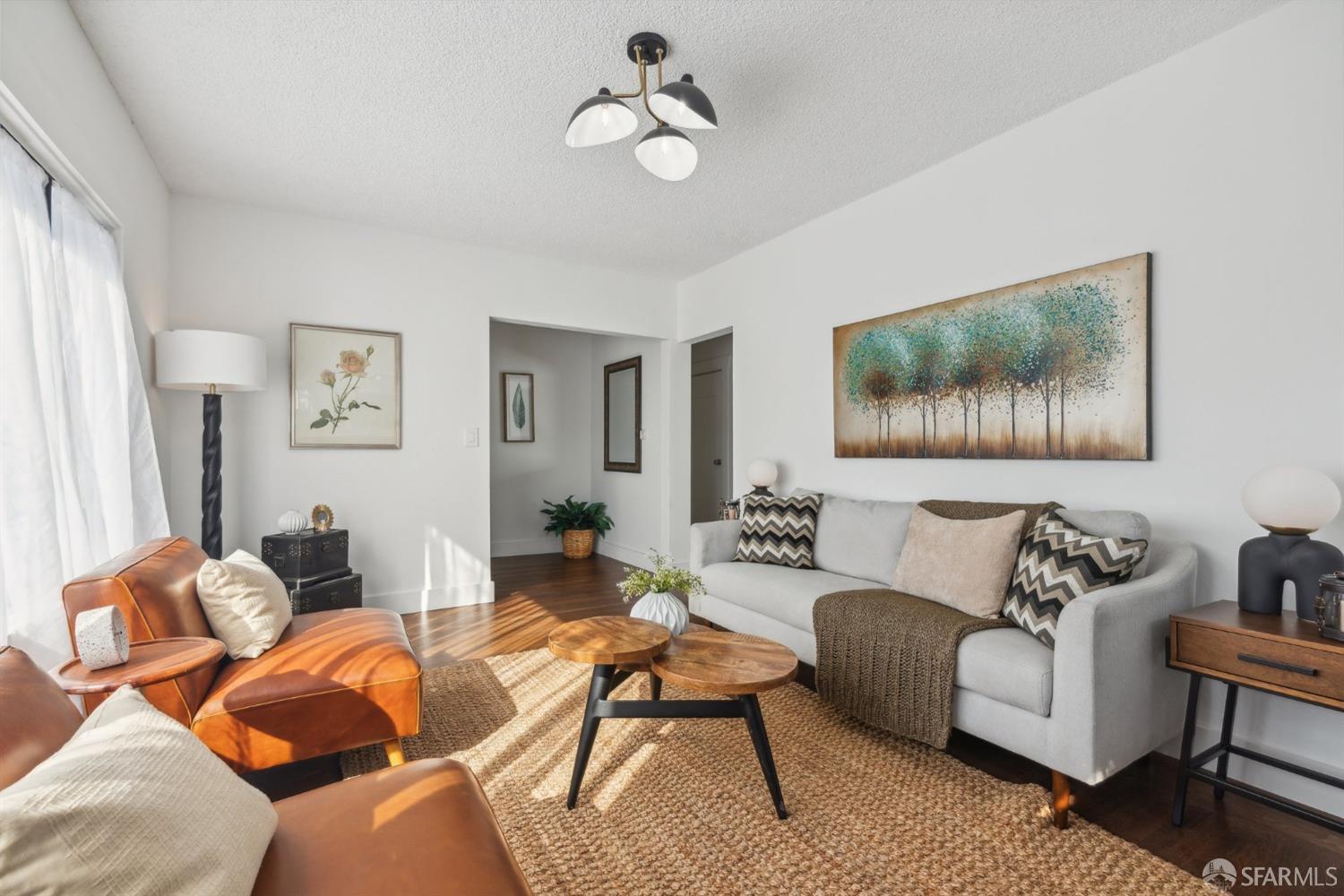 1521 Mitchell Street Oakland, CA 94601 - Photo 7 of 28 a living room with furniture potted plant and white walls